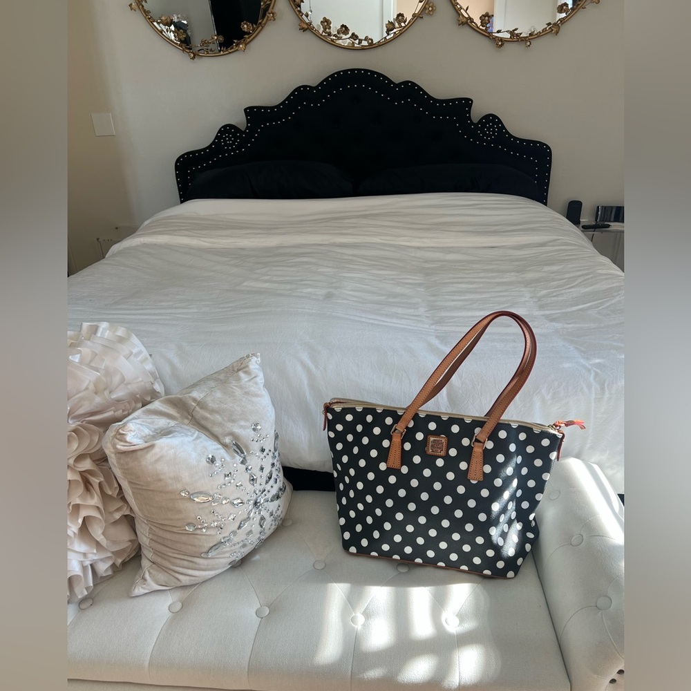 Dooney & Bourke black & white polka dot tote bag.